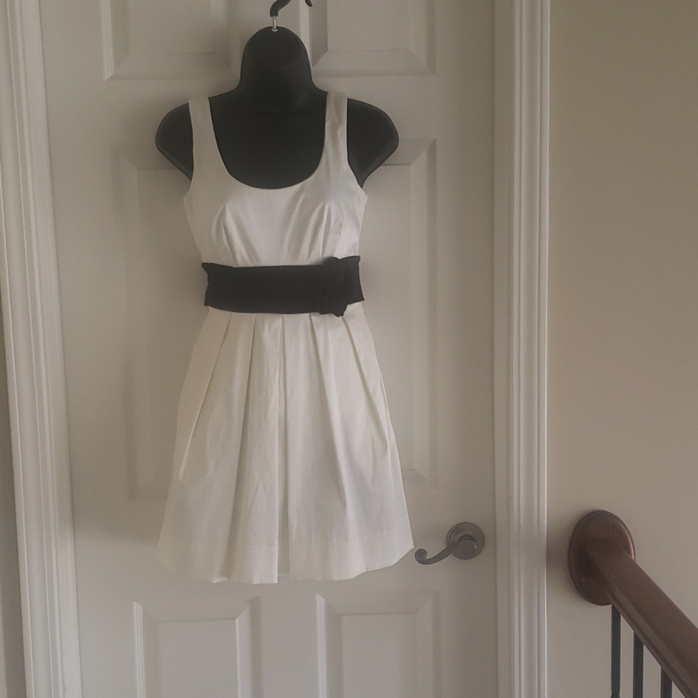 Cream with black tie and rose
